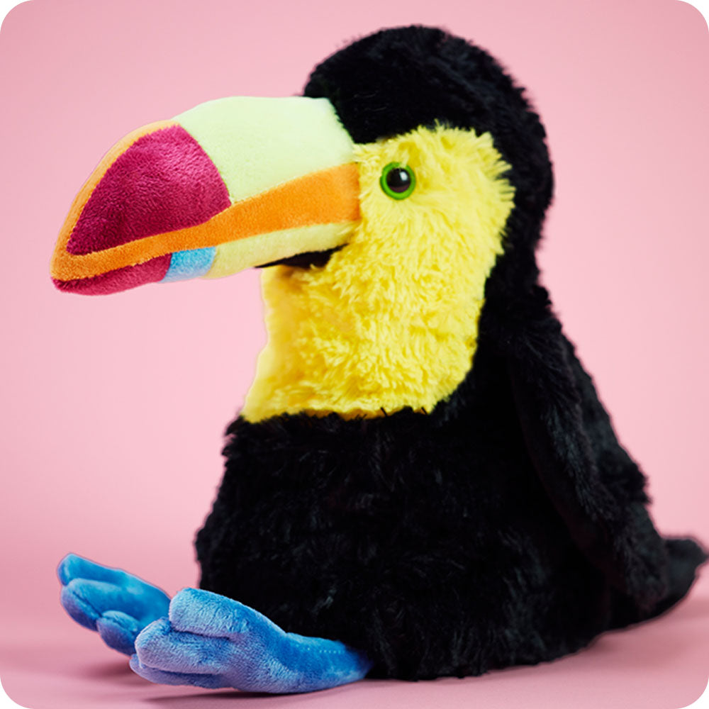 Image 99: warmies toucan stuffed animal on pink background
